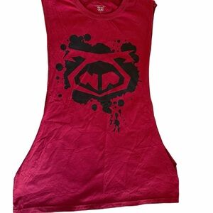 Nasty Pig red graphic tank top featuring a bold black logo splatter print.